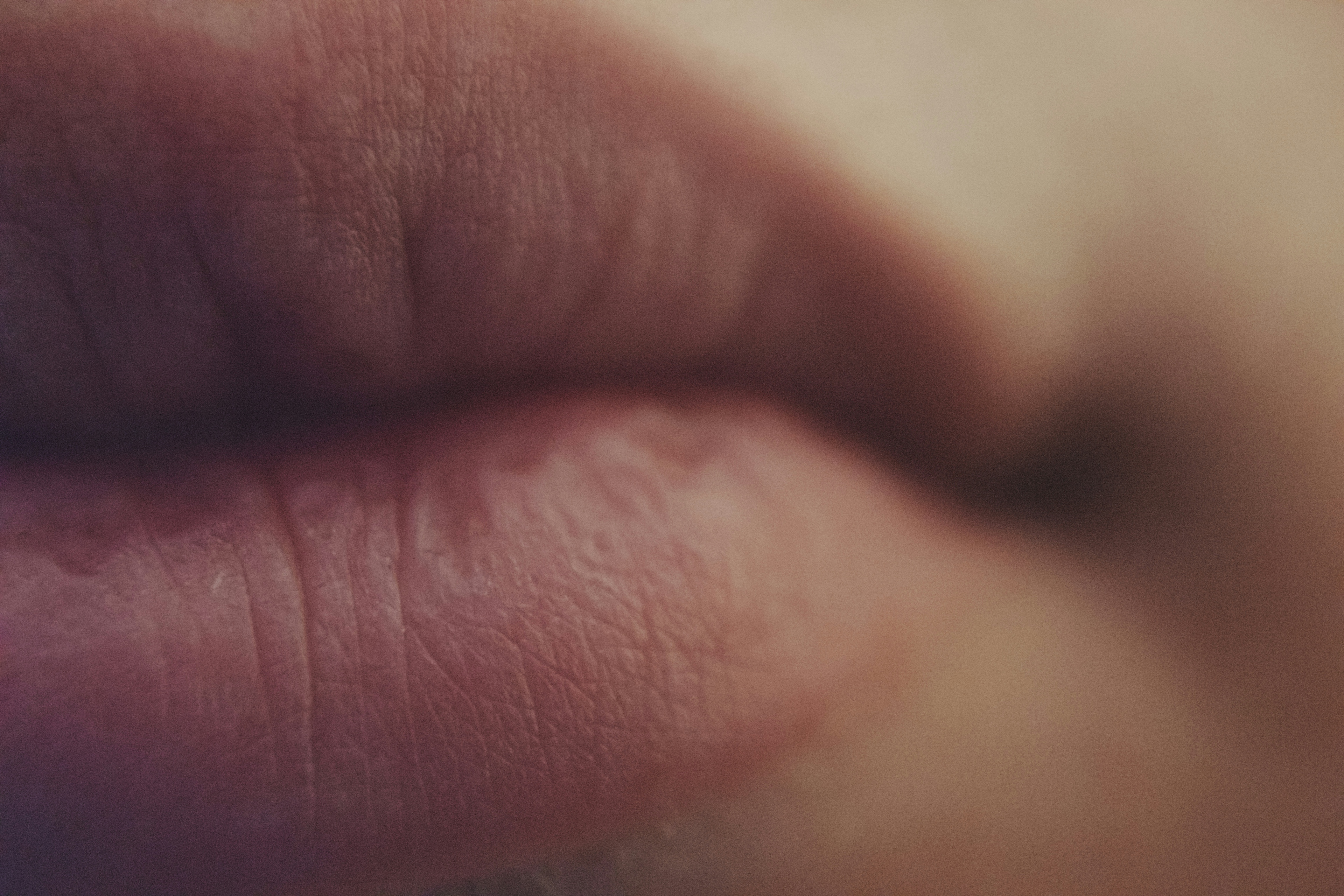 A macro photo of a pair of lips.